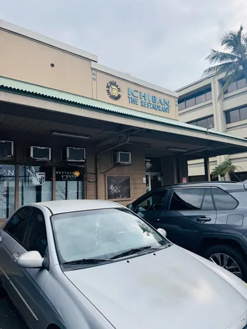 a bathroom with 2 sink and a mirror
