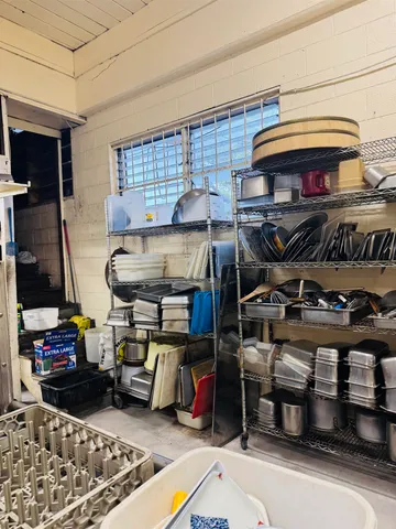 a kitchen with a stove and a sink