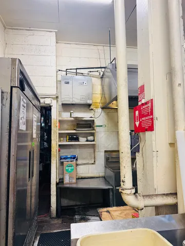 a bathroom with a sink and mirror