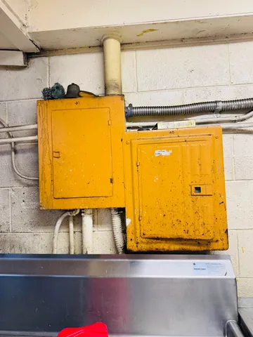 a kitchen with lots of counter top space and cabinets