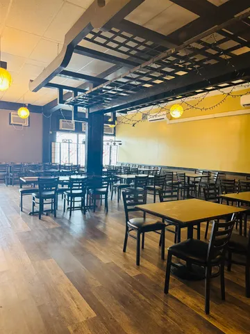 a view of a chairs and table in a patio