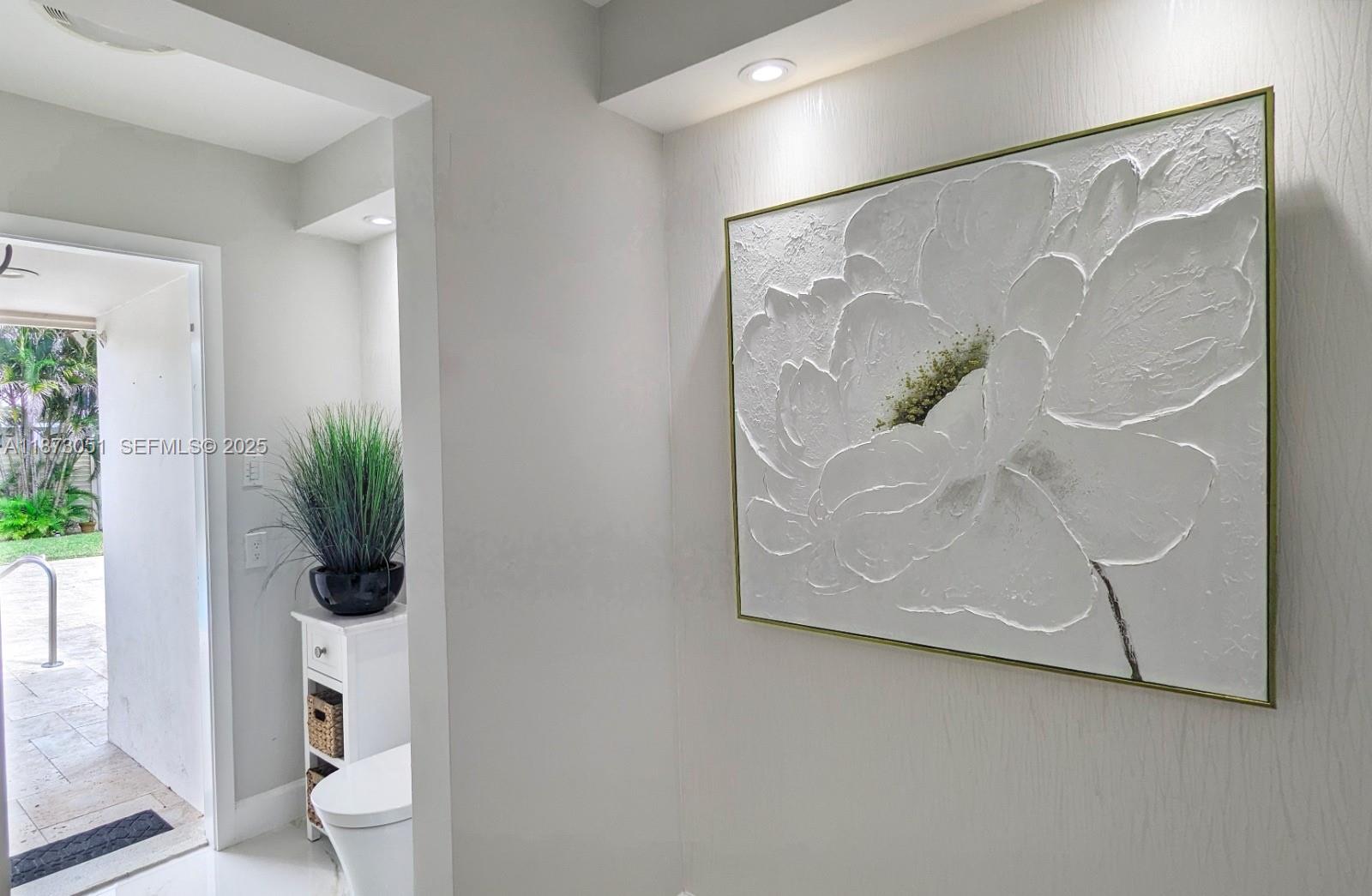 4027 Pierce Street Hollywood, FL 33021 - Photo 12 of 22 a bathroom with a shower and a toilet