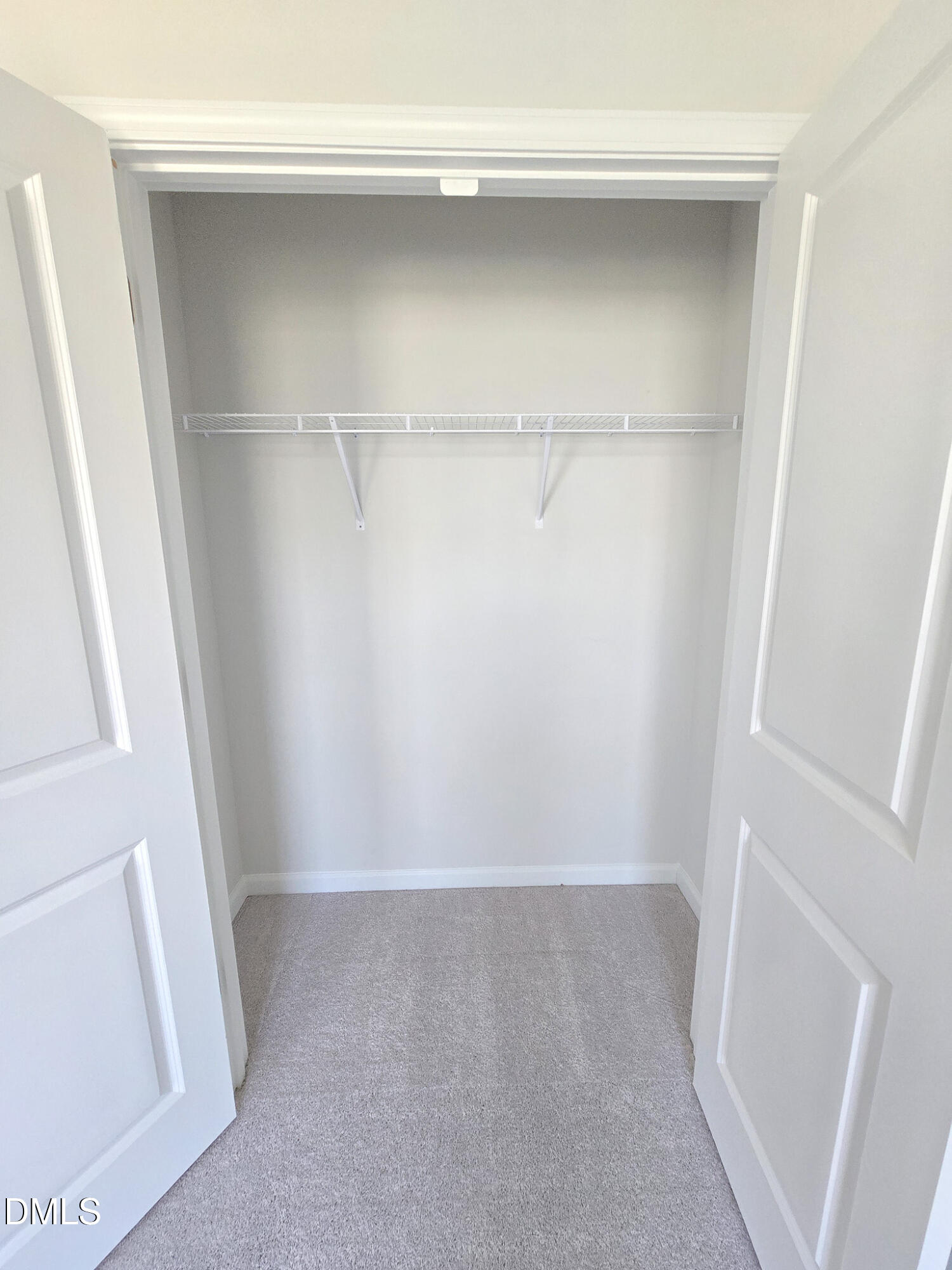 2431 Kasota Lane Raleigh, NC 27610 - Photo 8 of 46 a view of an empty walk in closet