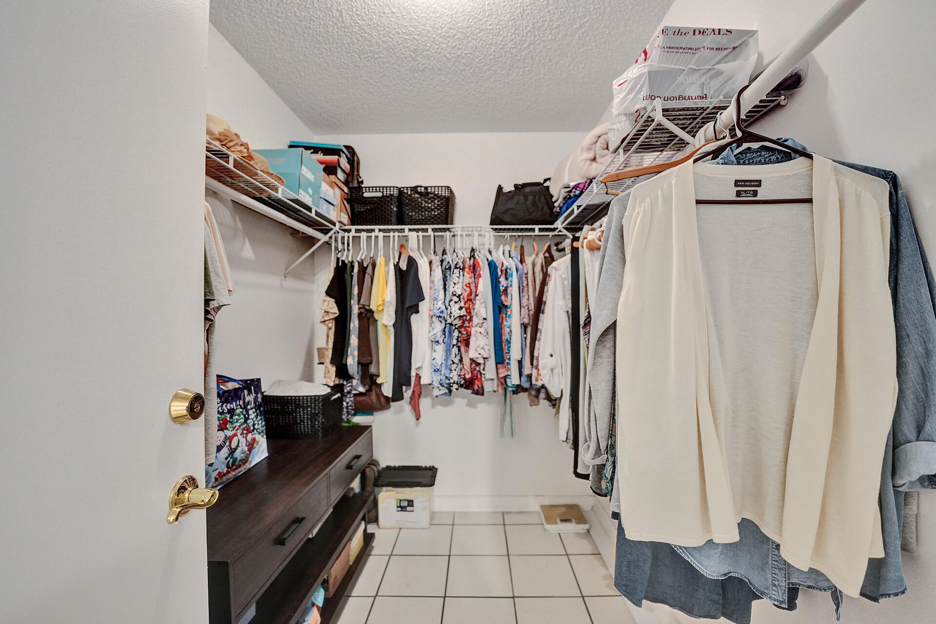 5447 Helene Circle Boynton Beach, FL 33472 - Photo 33 of 40 a view of a walk in closet