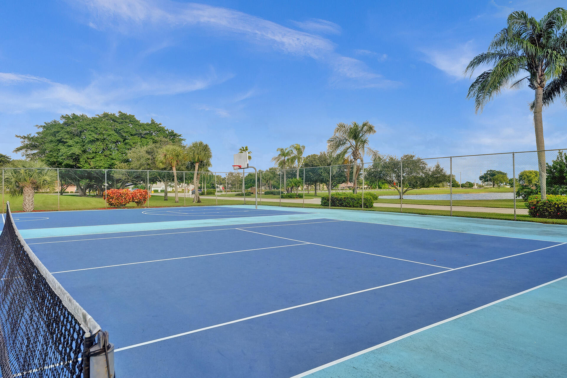 5447 Helene Circle Boynton Beach, FL 33472 - Photo 40 of 40 a view of a tennis court