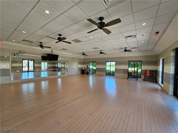 a view of a room with lots of wooden floors