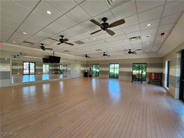a view of a room with lots of wooden floors