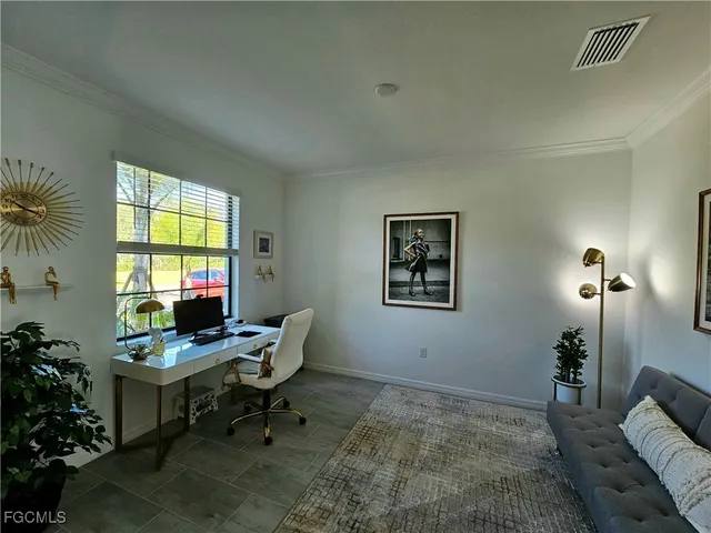 a living room with furniture and a couch