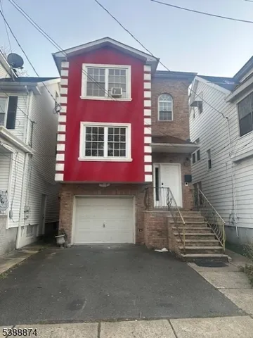 a view of a house with many windows