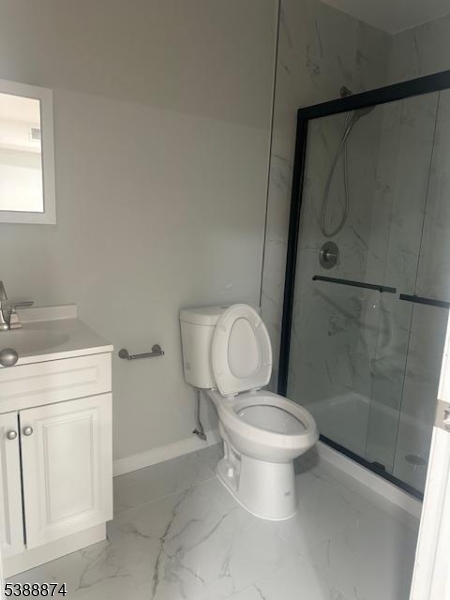 74 Kenmore Avenue, Unit 2 Newark, NJ 07106 - Photo 3 of 6 a bathroom with a toilet sink and a shower