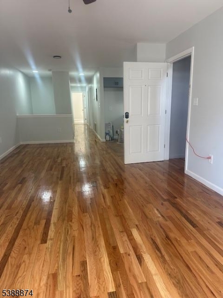 74 Kenmore Avenue, Unit 2 Newark, NJ 07106 - Photo 5 of 6 a view of entryway with wooden floor