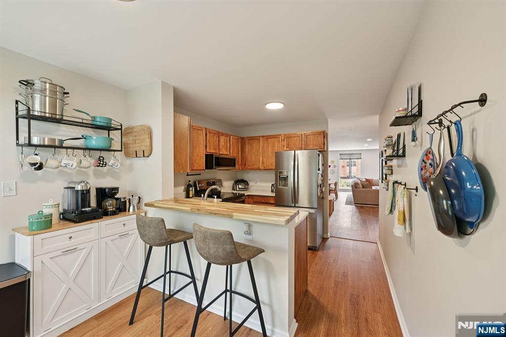50 Pine Street, Unit 206 Montclair, NJ 07042 - Photo 13 of 23 a view of a kitchen and dining room