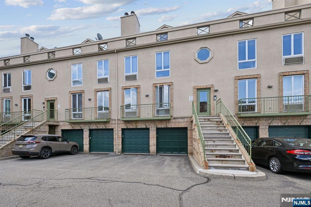 50 Pine Street, Unit 206 Montclair, NJ 07042 - Photo 22 of 23 a couple of cars parked in front of a building