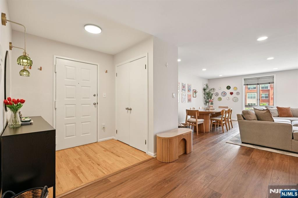 50 Pine Street, Unit 206 Montclair, NJ 07042 - Photo 3 of 23 a living room with furniture and wooden floor
