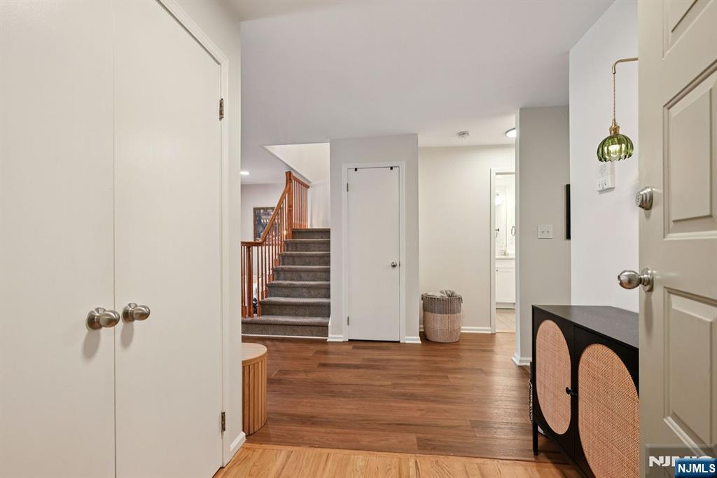 50 Pine Street, Unit 206 Montclair, NJ 07042 - Photo 4 of 23 a view of a room with wooden floor and staircase