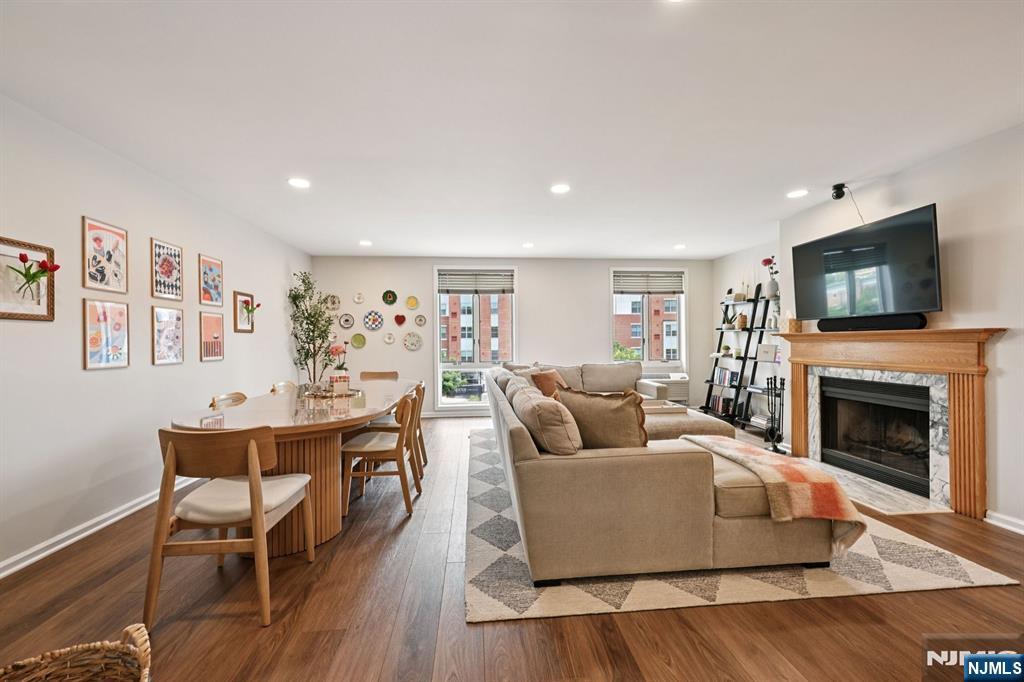50 Pine Street, Unit 206 Montclair, NJ 07042 - Photo 5 of 23 a living room with furniture fireplace and a flat screen tv