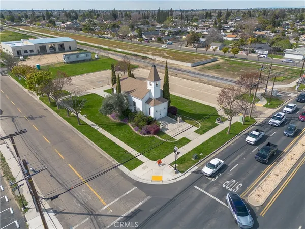an aerial view of a house with a lake view
