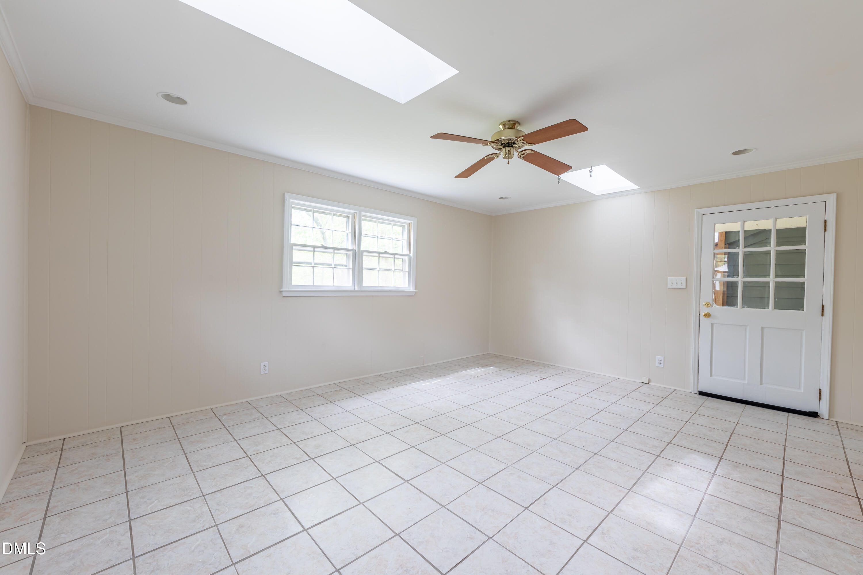 408 Ortega Road Raleigh, NC 27609 - Photo 11 of 25 a view of an empty room with a window