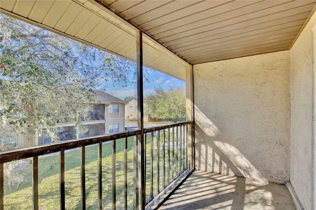 a view of a large window with an outdoor space