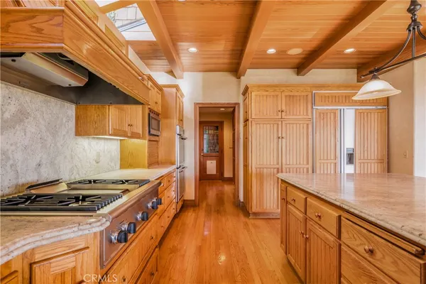 a view of a room with a ceiling fan