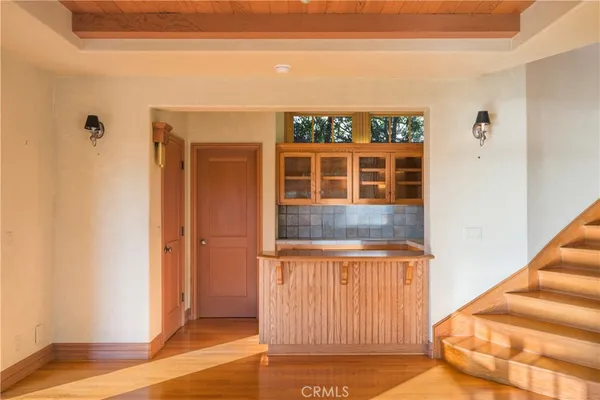 a view of a balcony with a ceiling fan