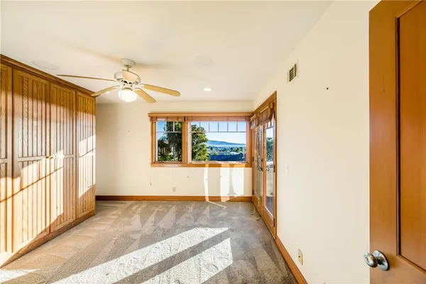 a large spacious bathroom with a large tub and sink
