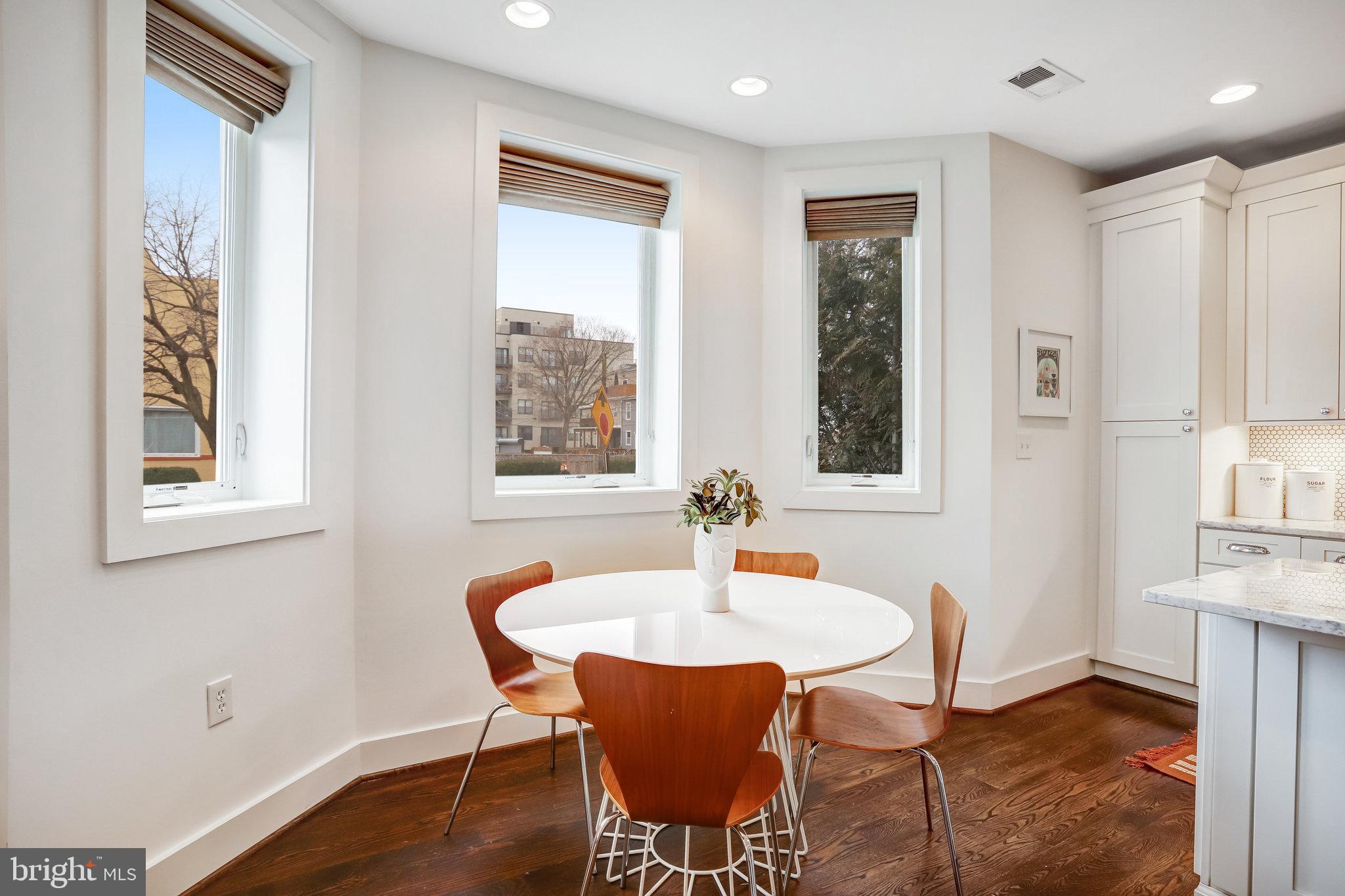 1200 Staples Street Northeast, Unit 1 Washington, DC 20002 - Photo 9 of 37 a dining room with furniture and window