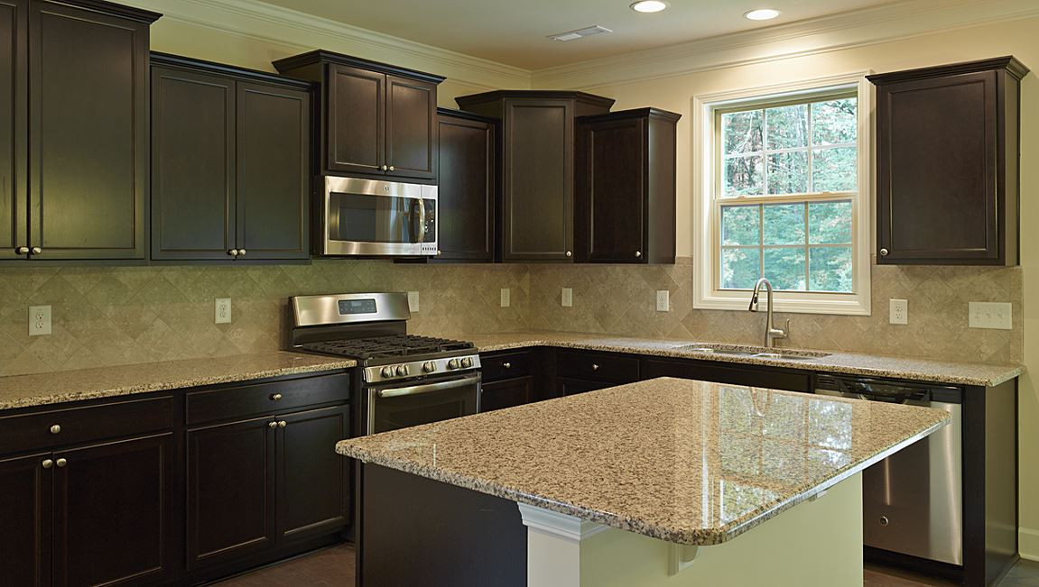 7500 Channery Way Raleigh, NC 27616 - Photo 4 of 25 all photos are of a completed Grant, Grant is home listed, Grant listed is under construction and photos are for illustration purposes only. Grant under construction will vary in exterior & interior appts, structurally home will be the same. Kitchen