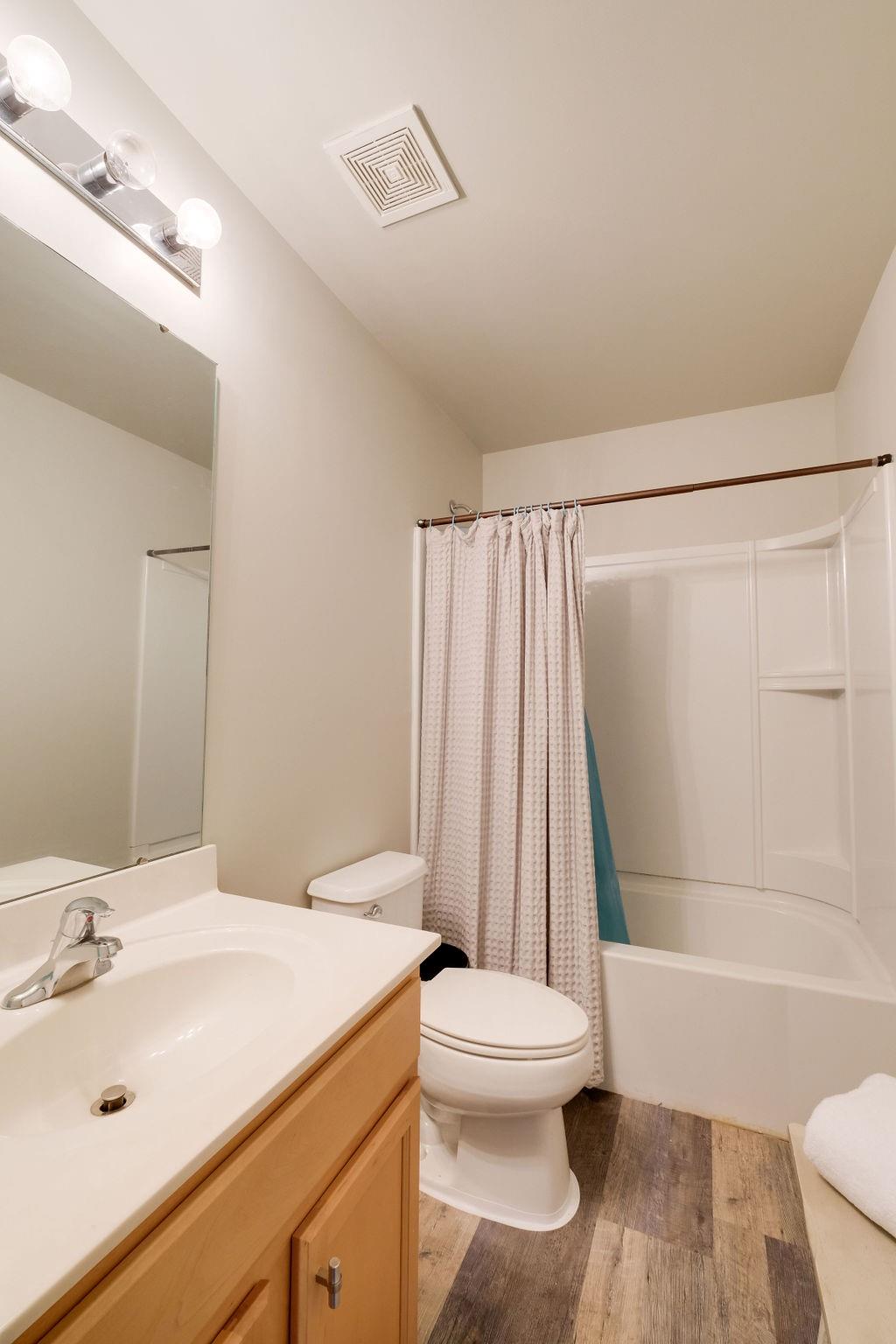 349 Sandy Spring Lane Clover, SC 29710 - Photo 15 of 28 a bathroom with a sink toilet and shower