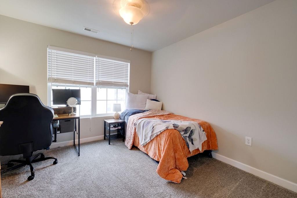 349 Sandy Spring Lane Clover, SC 29710 - Photo 19 of 28 a bedroom with bed and a window