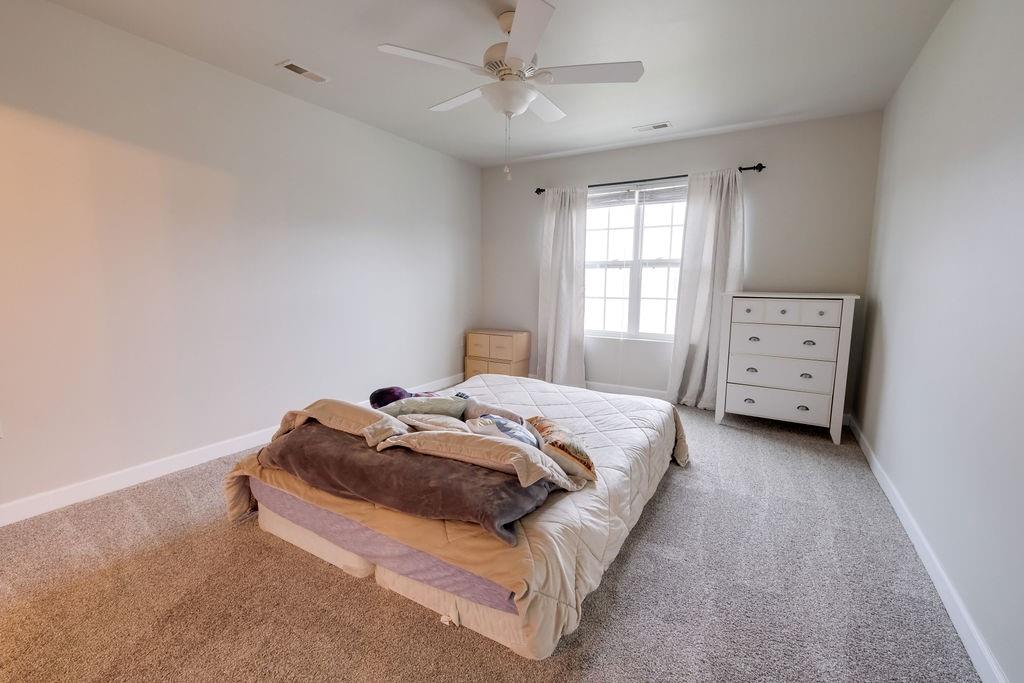 349 Sandy Spring Lane Clover, SC 29710 - Photo 21 of 28 a bedroom with a bed and a window