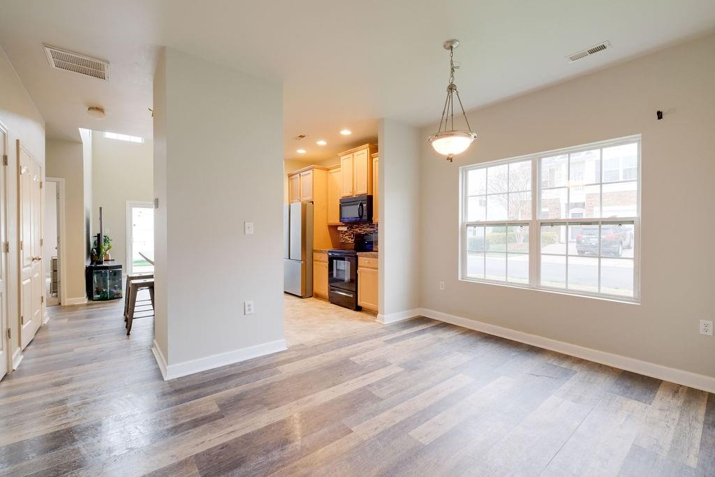 349 Sandy Spring Lane Clover, SC 29710 - Photo 3 of 28 a view of a room with window and wooden floor