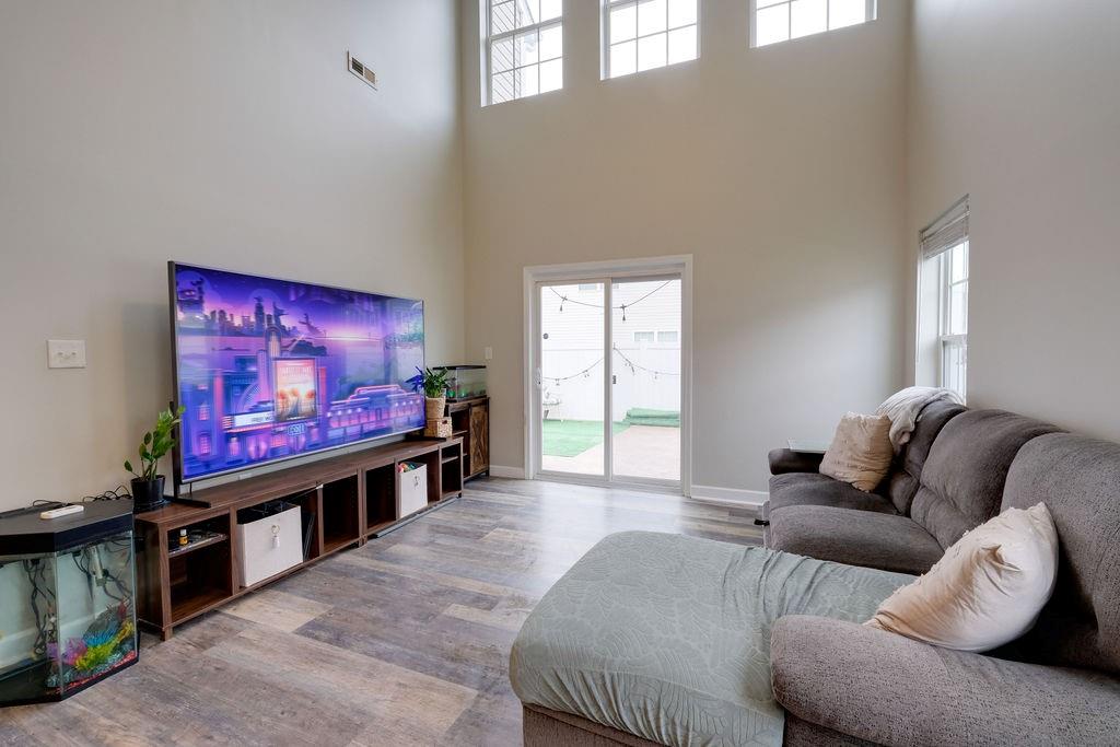 349 Sandy Spring Lane Clover, SC 29710 - Photo 9 of 28 a living room with furniture and a flat screen tv