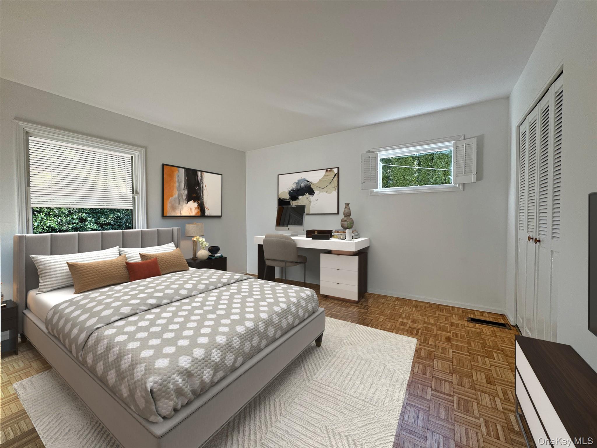 461 Pinebrook Boulevard New Rochelle, NY 10804 - Photo 17 of 32 a bedroom with a bed and a couch