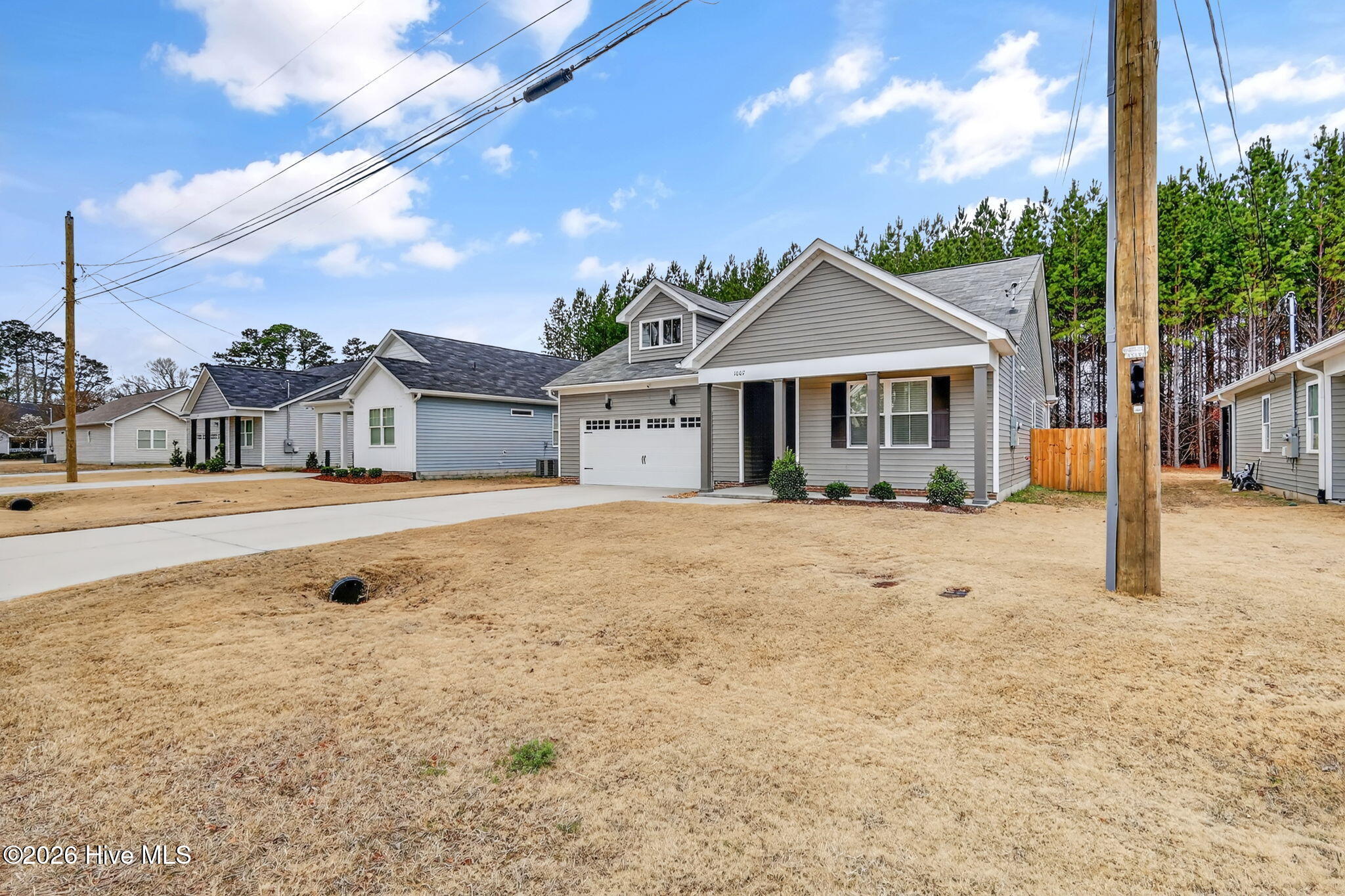 1007 Par Three Drive South Wilson, NC 27893 - Photo 2 of 38 1-web-or-mls-1007-par-3-dr-s-adam-bennet