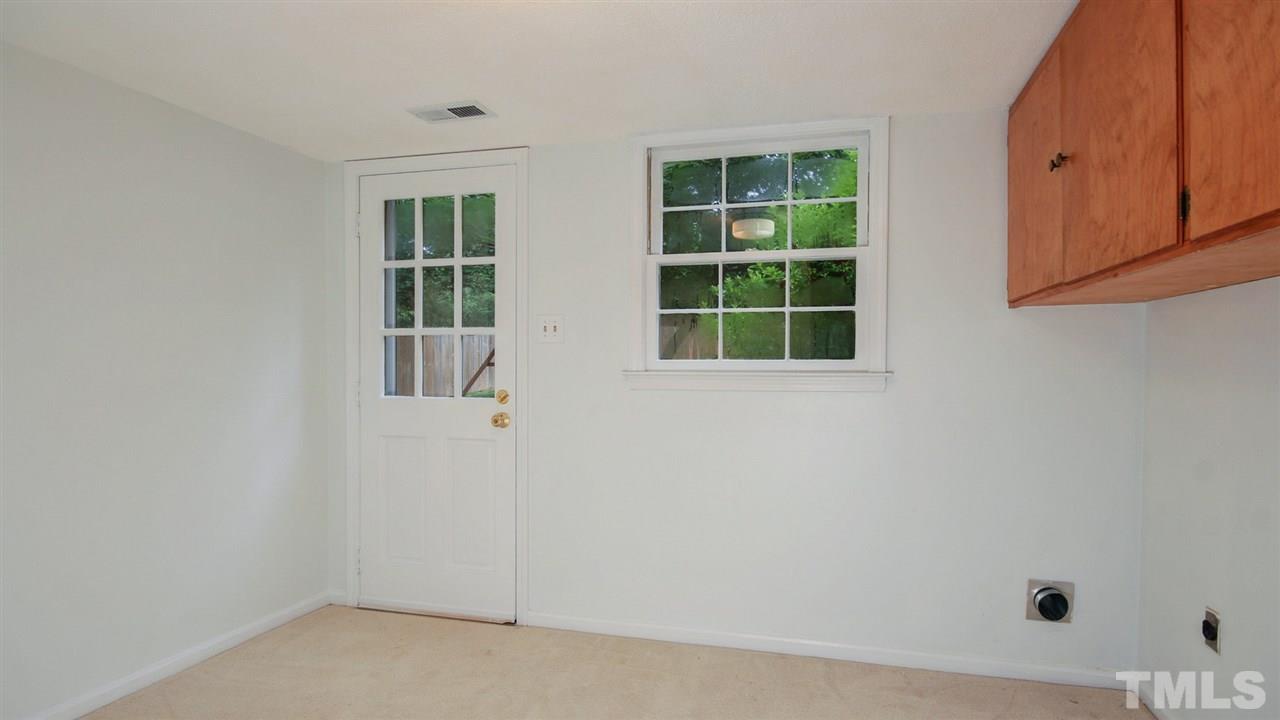 925 Pebblebrook Drive Raleigh, NC 27609 - Photo 15 of 23 an empty room with windows