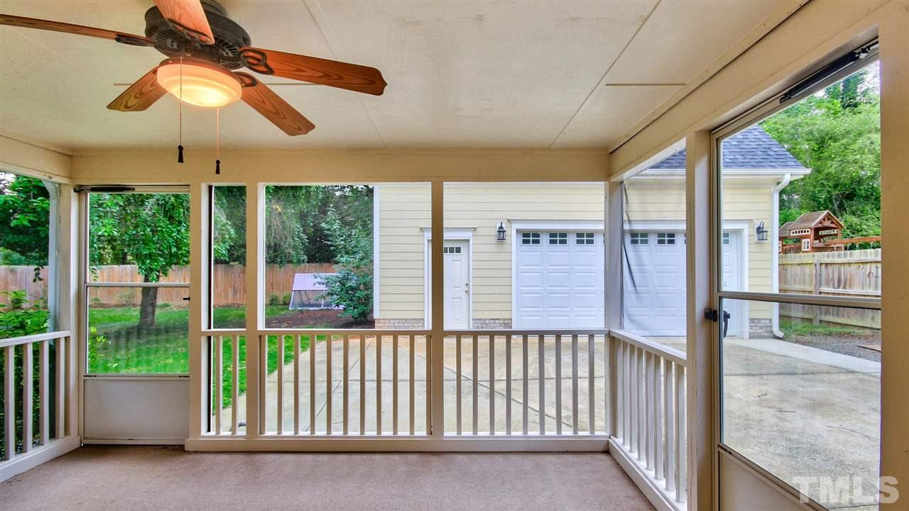 925 Pebblebrook Drive Raleigh, NC 27609 - Photo 20 of 23 a view of a porch with a floor to ceiling window