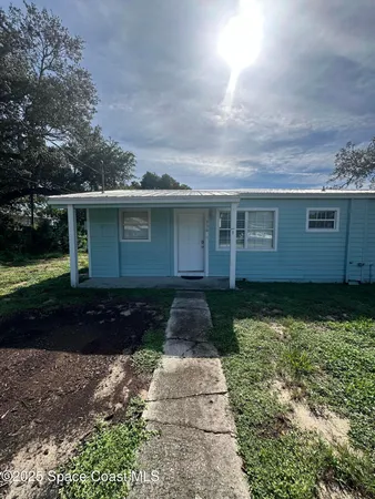 a front view of house with yard