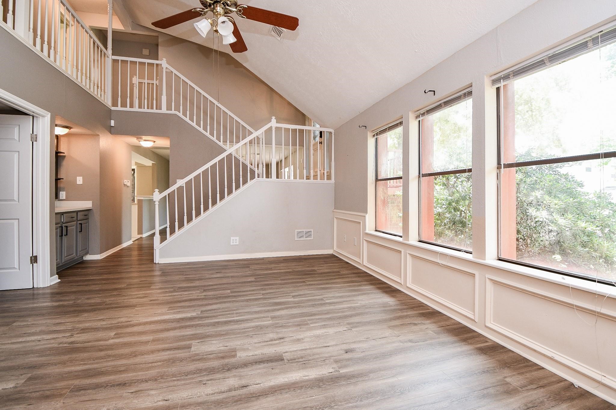2331 Wren Meadow Road Richmond, TX 77406 - Photo 8 of 37 Main living space showcasing large windows allowing the natural light to shine in!
