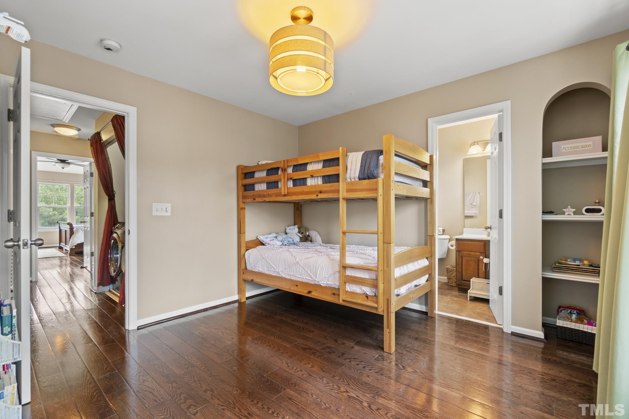 2956 Casona Way Raleigh, NC 27616 - Photo 18 of 27 a bedroom with bunk bed