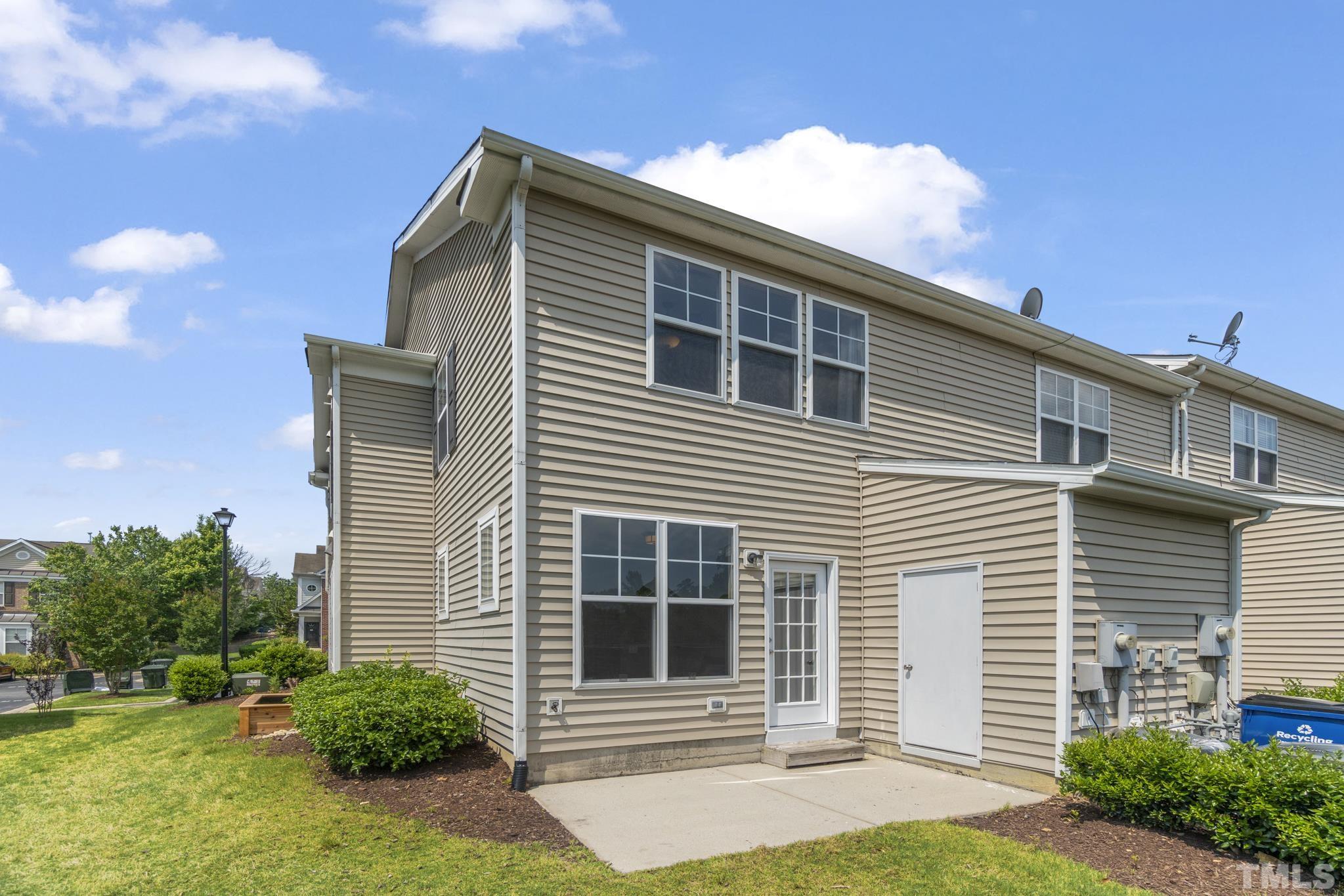 2956 Casona Way Raleigh, NC 27616 - Photo 23 of 27 a front view of a house with garden