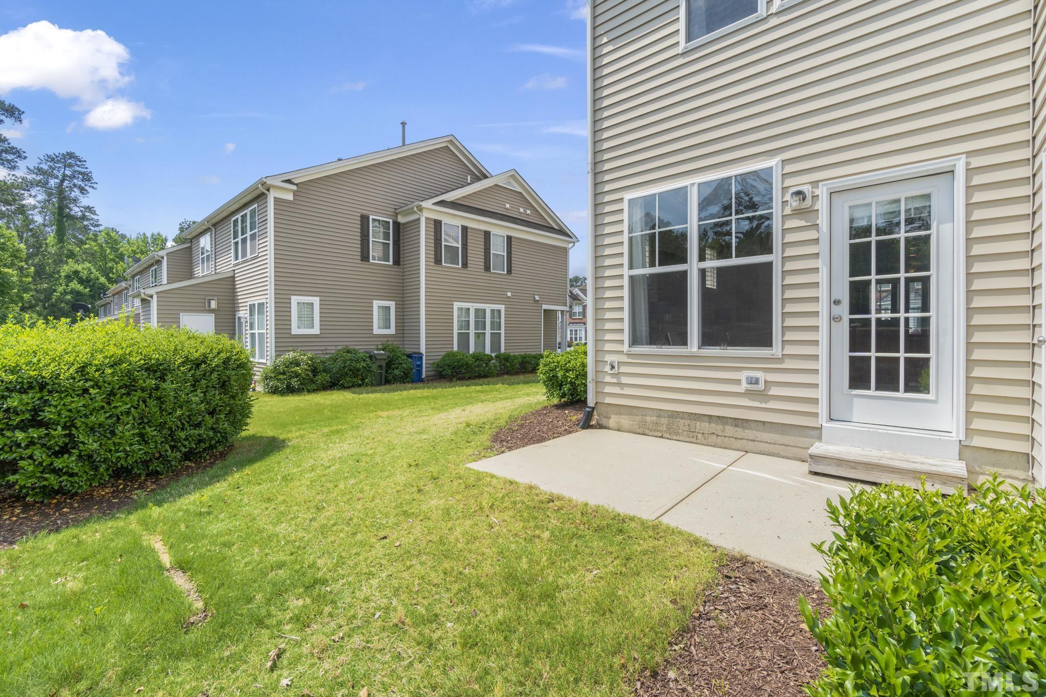 2956 Casona Way Raleigh, NC 27616 - Photo 24 of 27 a house view with a garden space