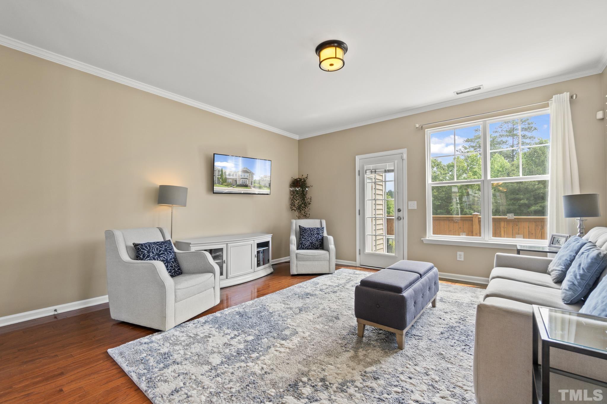 2956 Casona Way Raleigh, NC 27616 - Photo 6 of 27 a living room with furniture and a window
