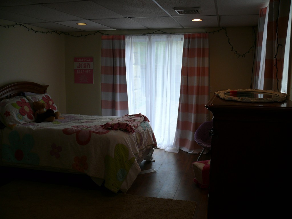 188 Mason Road Townsend, MA 01474 - Photo 13 of 22 a bed sitting in a bedroom next to a window