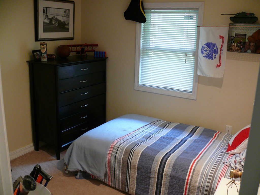 188 Mason Road Townsend, MA 01474 - Photo 14 of 22 a bedroom with a bed and a window