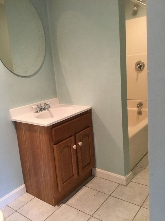 188 Mason Road Townsend, MA 01474 - Photo 16 of 22 a bathroom with a sink vanity and a mirror