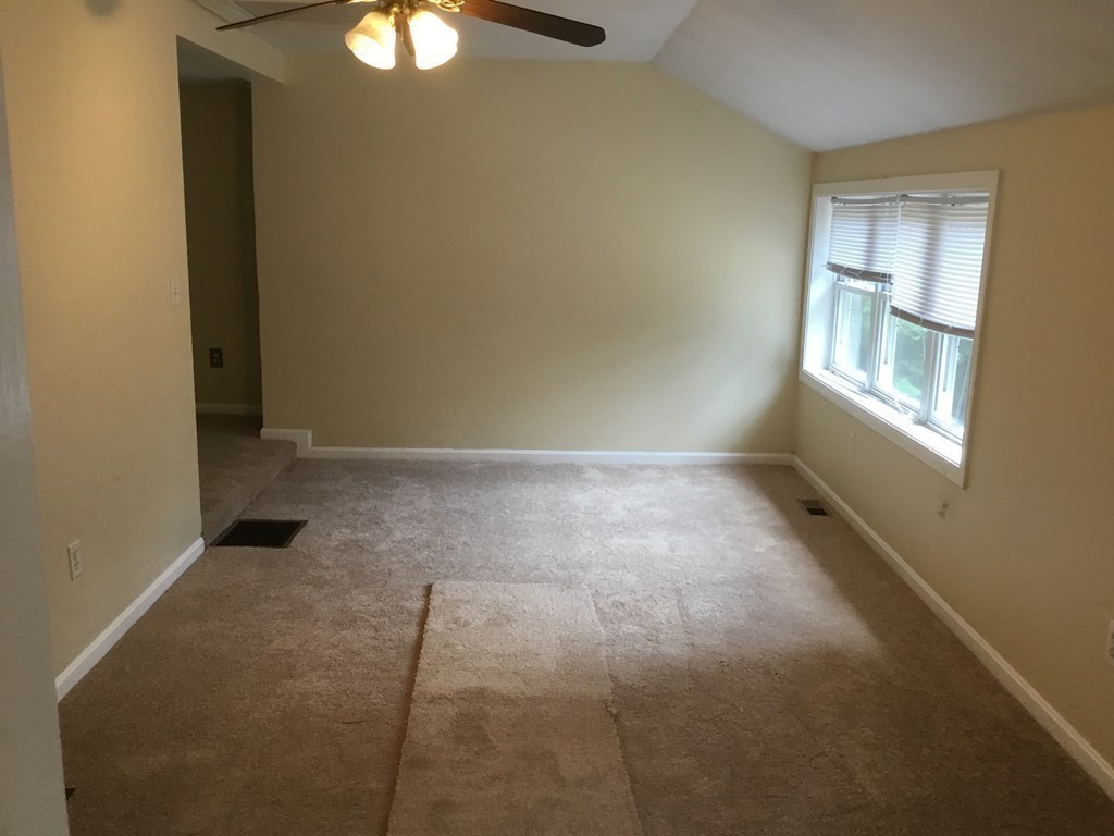188 Mason Road Townsend, MA 01474 - Photo 18 of 22 an empty room with windows and closet
