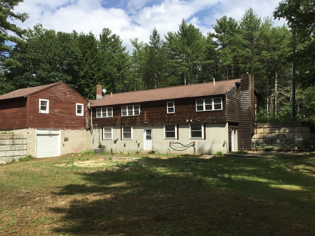 188 Mason Road Townsend, MA 01474 - Photo 21 of 22 a front view of a house with a garden