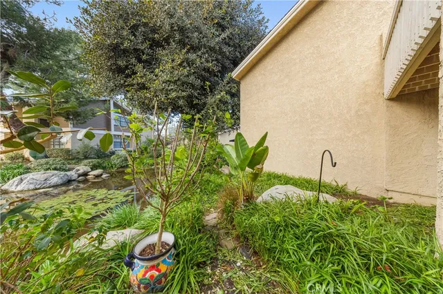a backyard of a house with lots of green space