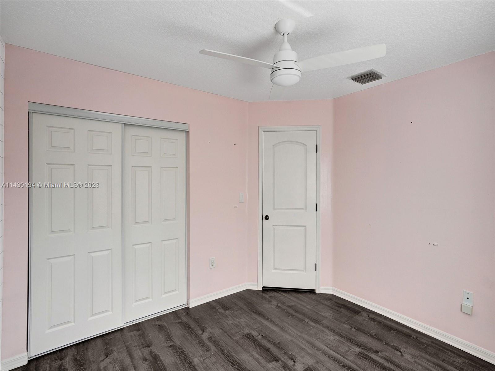 4185 Tree Top Road Cooper City, FL 33026 - Photo 23 of 36 a view of an empty room with a window